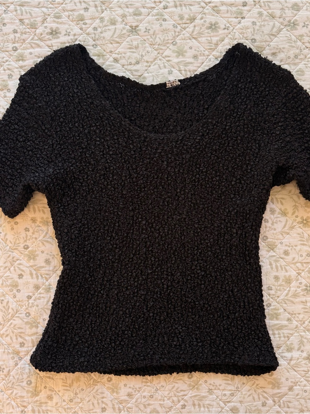 Black textured short sleeve top